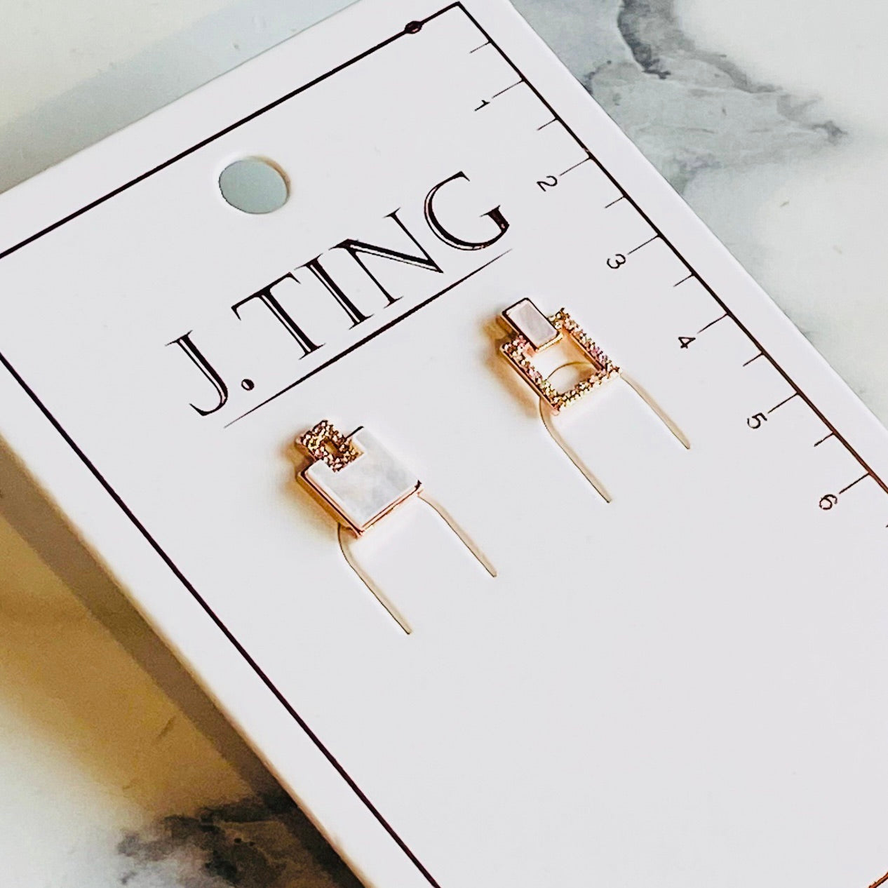 Small Pearly White Opposite Earrings